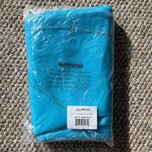 Turquoise 90 inch round polyester tablecloth new with tags